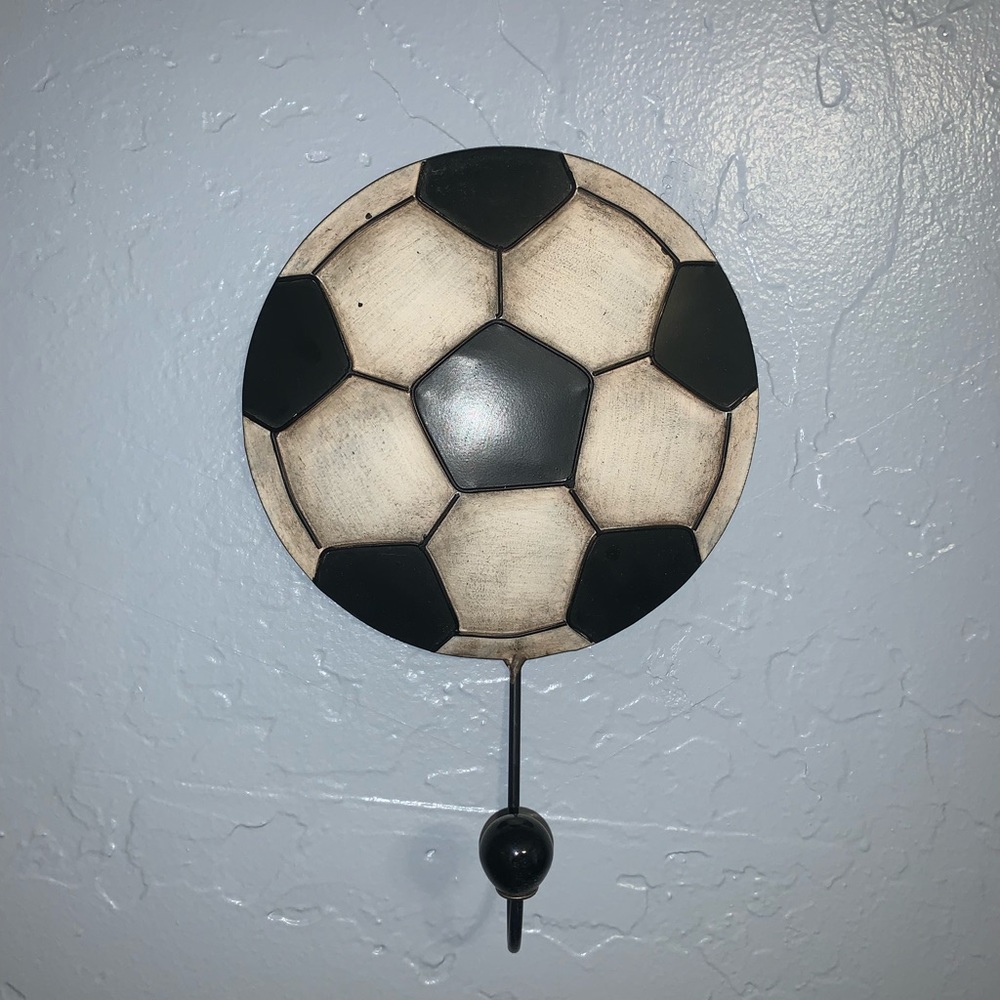 Soccer ball coat hanger